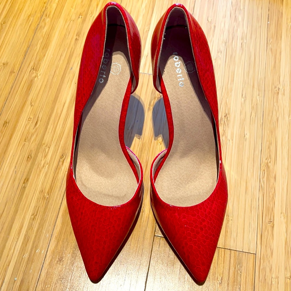 - Red heels, NWOT. Purchased in Europe